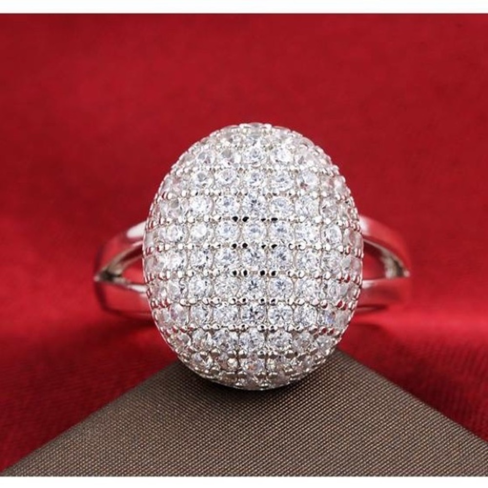 Silver ring Marked .925 CZ stones No diamonds Dome Ring